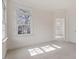 Inviting bedroom bathed in natural light, showcasing windows and soft carpeting at 302 Edinburgh Dr, Cary, NC 27511