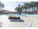 Large community pool with a slide and golf cart seating at 302 Edinburgh Dr, Cary, NC 27511