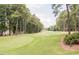 Scenic view of the lush green golf course at 302 Edinburgh Dr, Cary, NC 27511