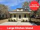Charming single story home boasts a covered front porch and newly landscaped front yard at 315 S Maple Ave, Kenly, NC 27542