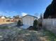 Functional backyard storage shed surrounded by lovely landscaping for storing tools at 3800 Long Meadow Dr, Mebane, NC 27302