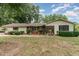 Charming one-story home with well-maintained landscaping and inviting front entrance at 4322 Russell Rd, Graham, NC 27253