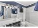 Stylish bathroom with a modern vanity, and a clean white subway tile shower/tub combo at 503 Sherwood Dr, Sanford, NC 27330