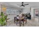 Dining room featuring natural lighting, a wood table, and decorative plants at 503 Sherwood Dr, Sanford, NC 27330