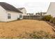 View of a backyard with privacy fence at 5420 Golden Moss Trl, Raleigh, NC 27613