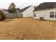 Spacious backyard featuring a privacy fence and well-maintained lawn space at 5420 Golden Moss Trl, Raleigh, NC 27613
