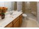 Well-appointed bathroom features a walk-in shower with seat and vanity at 5420 Golden Moss Trl, Raleigh, NC 27613