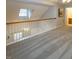 Upstairs hallway with neutral carpet at 5420 Golden Moss Trl, Raleigh, NC 27613