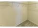 Empty walk-in closet at 5420 Golden Moss Trl, Raleigh, NC 27613