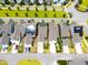 An aerial shot captures the density of a suburban area, highlighting solar panels on roofs at 5520 Advancing Ave, Raleigh, NC 27616