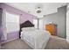 Comfortable bedroom with a plush bed, soft lighting, and calming colors offering a peaceful retreat at 5520 Advancing Ave, Raleigh, NC 27616
