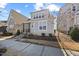 Charming two-story home features a welcoming front porch and professionally maintained landscaping at 5520 Advancing Ave, Raleigh, NC 27616