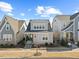 Charming two-story home with a covered front porch and well landscaped front yard at 5520 Advancing Ave, Raleigh, NC 27616