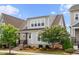 Charming two-story home with a covered front porch and meticulously maintained landscaping at 5520 Advancing Ave, Raleigh, NC 27616