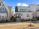 Charming two-story home with a inviting front porch and a well-maintained yard at 5520 Advancing Ave, Raleigh, NC 27616