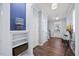 Welcoming foyer with hardwood floors, built-in shelving, and plenty of natural light at 5520 Advancing Ave, Raleigh, NC 27616