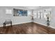Spacious living room featuring natural light, hardwood flooring, and modern decor at 5520 Advancing Ave, Raleigh, NC 27616
