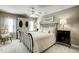 Cozy bedroom featuring a metal bed, wood furniture, and natural light at 5708 Creekfall Ln, Fuquay Varina, NC 27526