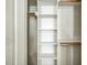 Walk-in closet with a custom shelving system for optimal organization at 5708 Creekfall Ln, Fuquay Varina, NC 27526