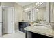Stylish main bathroom featuring a double sink with granite counters at 5708 Creekfall Ln, Fuquay Varina, NC 27526
