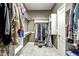 Well-organized walk-in closet with custom shelving and ample storage space at 5708 Creekfall Ln, Fuquay Varina, NC 27526