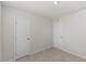 Bedroom features neutral carpeting and paint with a closet on the left and right wall at 669 Impala Trce, Wendell, NC 27591