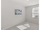 Bedroom with gray carpeting, natural lighting, and wall art at 669 Impala Trce, Wendell, NC 27591