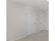 Neutral bedroom with two panel doors and neutral carpet at 669 Impala Trce, Wendell, NC 27591