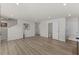 Spacious living room featuring wood-look flooring, recessed lighting and an open layout at 669 Impala Trce, Wendell, NC 27591