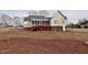 Expansive backyard featuring a screened porch and ample green space at 730 Duck Pond Rd, Nashville, NC 27856