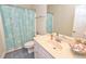 Cozy bathroom features a marble sink and tiled floors at 730 Duck Pond Rd, Nashville, NC 27856