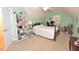 Bright bedroom with a desk and ceiling fan at 730 Duck Pond Rd, Nashville, NC 27856