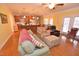 Open living space with hardwood floors and connecting spaces at 730 Duck Pond Rd, Nashville, NC 27856