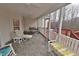 Spacious screened patio with an outdoor lounge at 730 Duck Pond Rd, Nashville, NC 27856