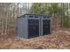 Durable outdoor shed for extra storage on the property at 75 Cherryhill Dr, Four Oaks, NC 27524