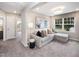 Comfortable living room showcasing a sofa and accent pillows near a bright window at 810 Spoonbill Ct, Durham, NC 27703