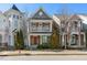 Charming two-story home with brick facade, covered porch, and white railing at 968 Shoofly Path, Apex, NC 27502