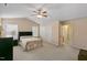 Large main bedroom with neutral tones, a ceiling fan, and a vaulted ceiling at 968 Shoofly Path, Apex, NC 27502