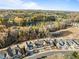 An aerial of the homes and pond in a beautiful landscape at 1027 Laurelwood Dr, Durham, NC 27705