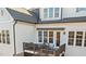 Second story deck featuring outdoor seating with home awning detail at 1027 Laurelwood Dr, Durham, NC 27705