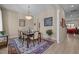 Inviting dining room featuring a stylish chandelier and a decorative rug at 1027 Laurelwood Dr, Durham, NC 27705