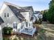 Backyard featuring a deck, perfect for outdoor entertaining and relaxation at 1028 Dotson Way, Apex, NC 27523