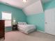 Cozy bedroom with sloped ceilings, one window, and carpet flooring at 1028 Dotson Way, Apex, NC 27523