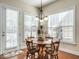 Bright breakfast nook with hardwood floors, natural light, and a cozy dining table at 1028 Dotson Way, Apex, NC 27523