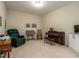 Bright and airy living room with hardwood floors, large windows, and ample seating at 1028 Dotson Way, Apex, NC 27523