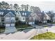 Charming neighborhood street view featuring well-maintained homes and landscaping at 1028 Dotson Way, Apex, NC 27523