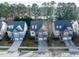 Charming neighborhood street view with well-maintained homes and landscaping at 1028 Dotson Way, Apex, NC 27523