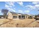 Backyard with a screened-in porch and view of the corner lot at 1100 Gaston Manor Dr, Durham, NC 27703