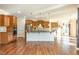 Spacious kitchen with wood cabinets, granite countertops, and a large center island at 1100 Gaston Manor Dr, Durham, NC 27703
