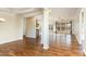 Bright, open-concept living space with hardwood floors and a large window array at 1100 Gaston Manor Dr, Durham, NC 27703